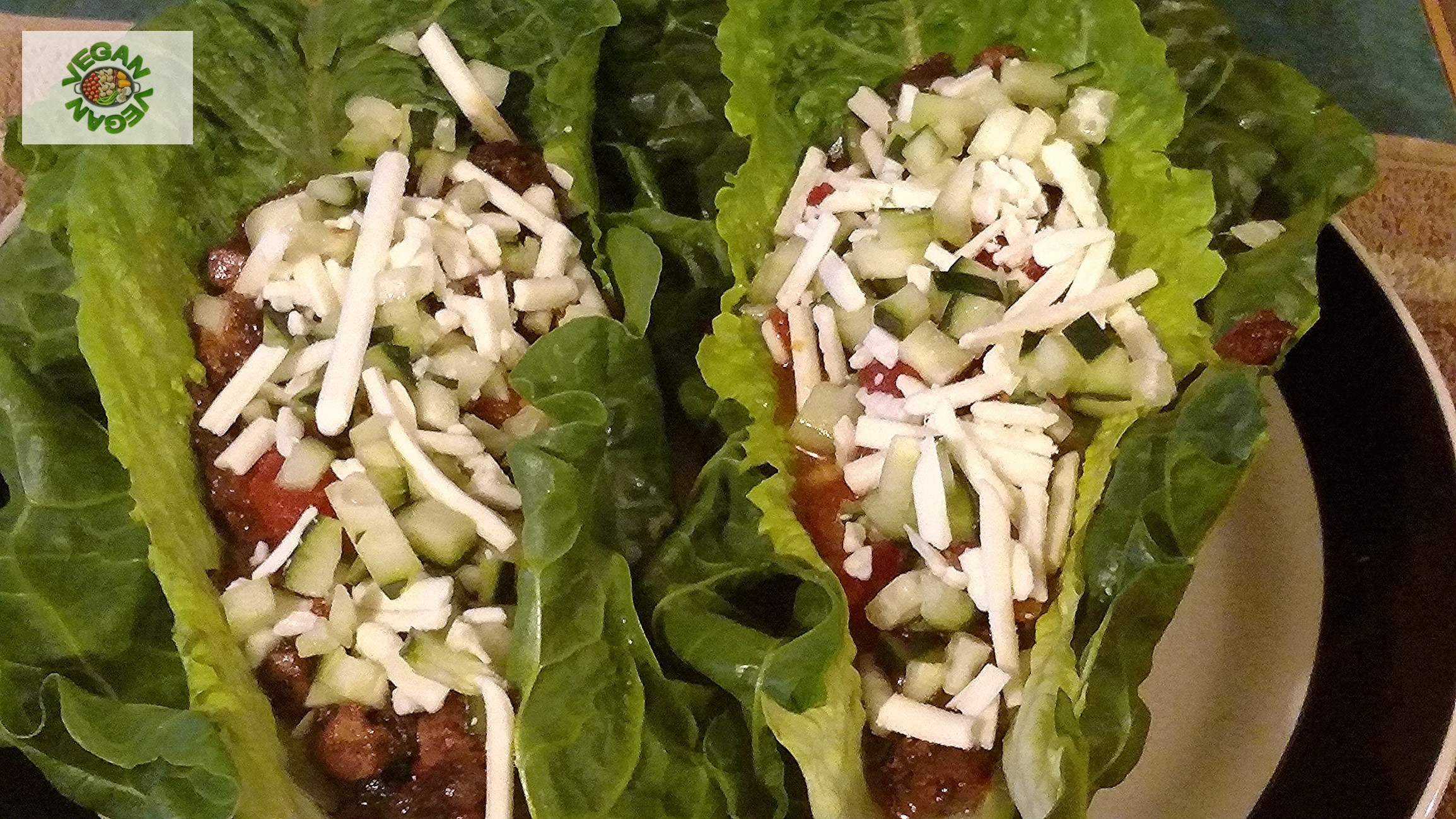 Vegan tacos recipe in lettuce wraps feature photo. 100% vegan. 100% healthy. 100% delicious.