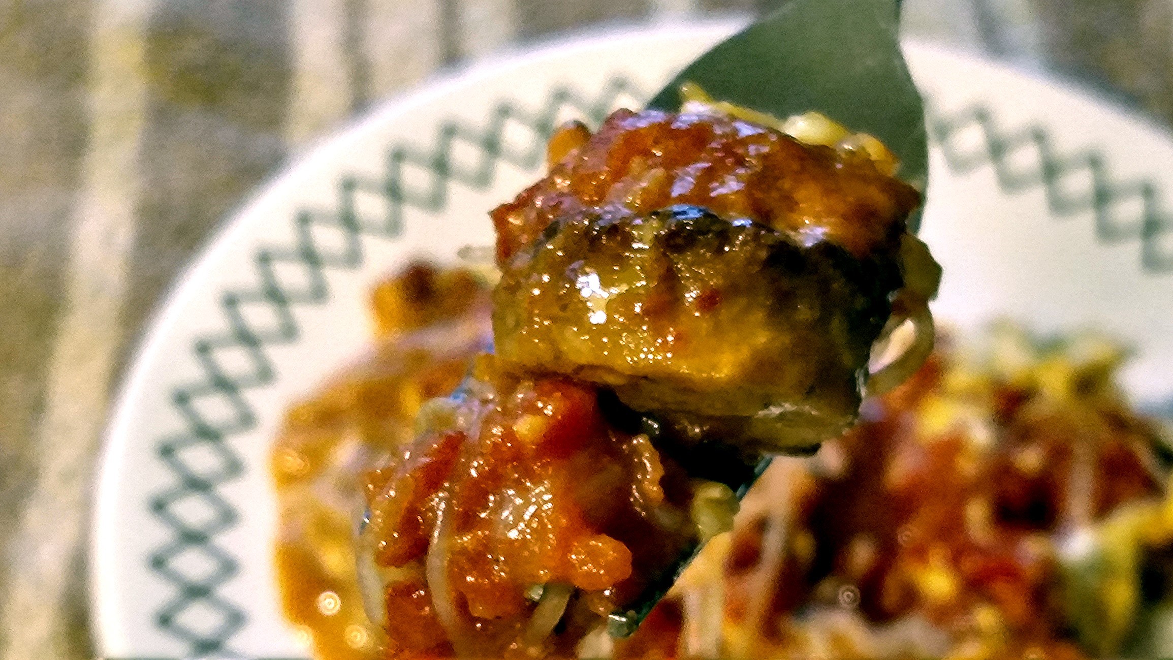 Vegan Italian sausage recipe close up on a fork